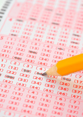 lottery ticket and pencil