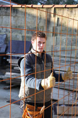 Man with reinforcement grid