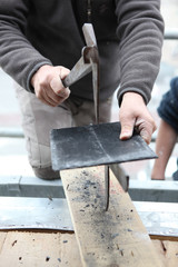 Man cutting slate