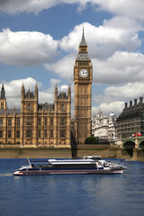 Fototapeta na wymiar Big Ben with city boat in London, UK