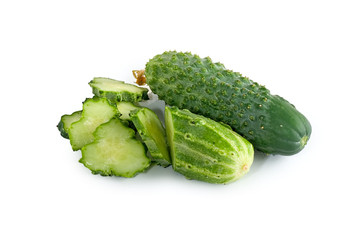 Cucumber and slices isolated over white background.