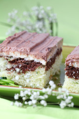 Zucchini cake with vanilla cream and chocolate sour cream