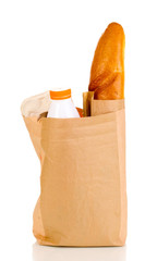 Paper bag with food isolated on white