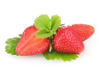 sweet ripe strawberries with leaves isolated on white