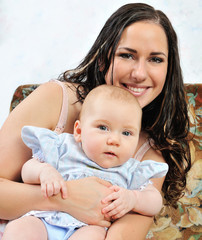 Beautiful mother with her newborn baby.