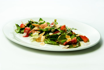 Roasted Strawberries with lettuce leaves and nuts