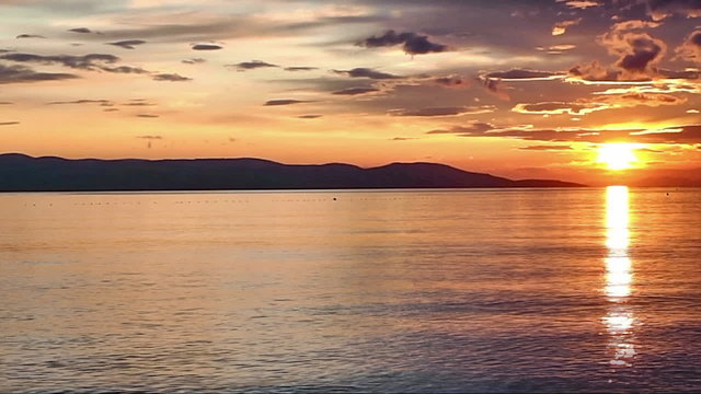 Sunset over sea timelapse
