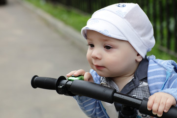 Curious child on bicycle