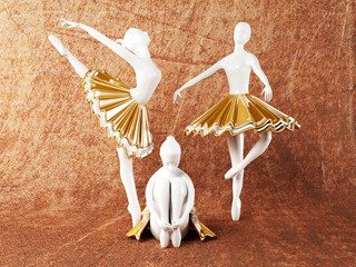 three beautiful statues of ballerinas