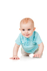 Smiling baby crawling forward