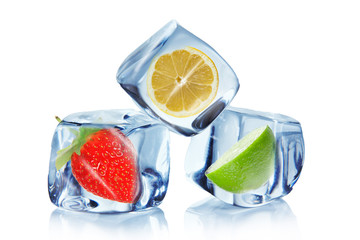 Fruit in ice cubes over white