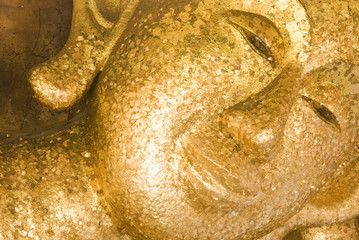 Golden reclining buddha in Thailand