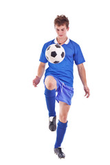 Soccer player with a ball