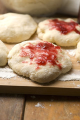 Sweet doughnuts with rose marmelade