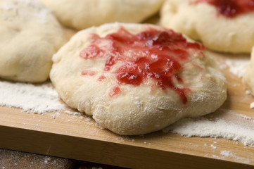 Sweet doughnuts with rose marmelade