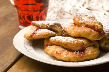 Sweet doughnuts with rose marmelade