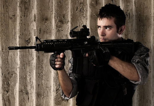 young soldier aiming
