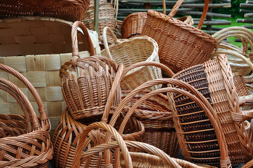 A lot of vintage weave wicker baskets on a marketplace