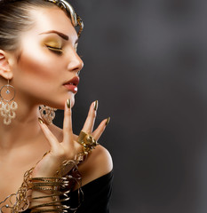 Fashion Girl Portrait. Golden Makeup
