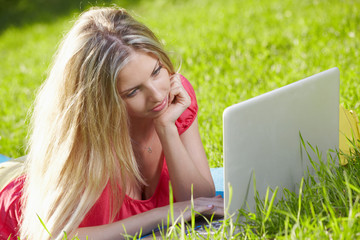 On the meadow with laptop