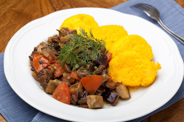 Polenta slices with vegetable stew