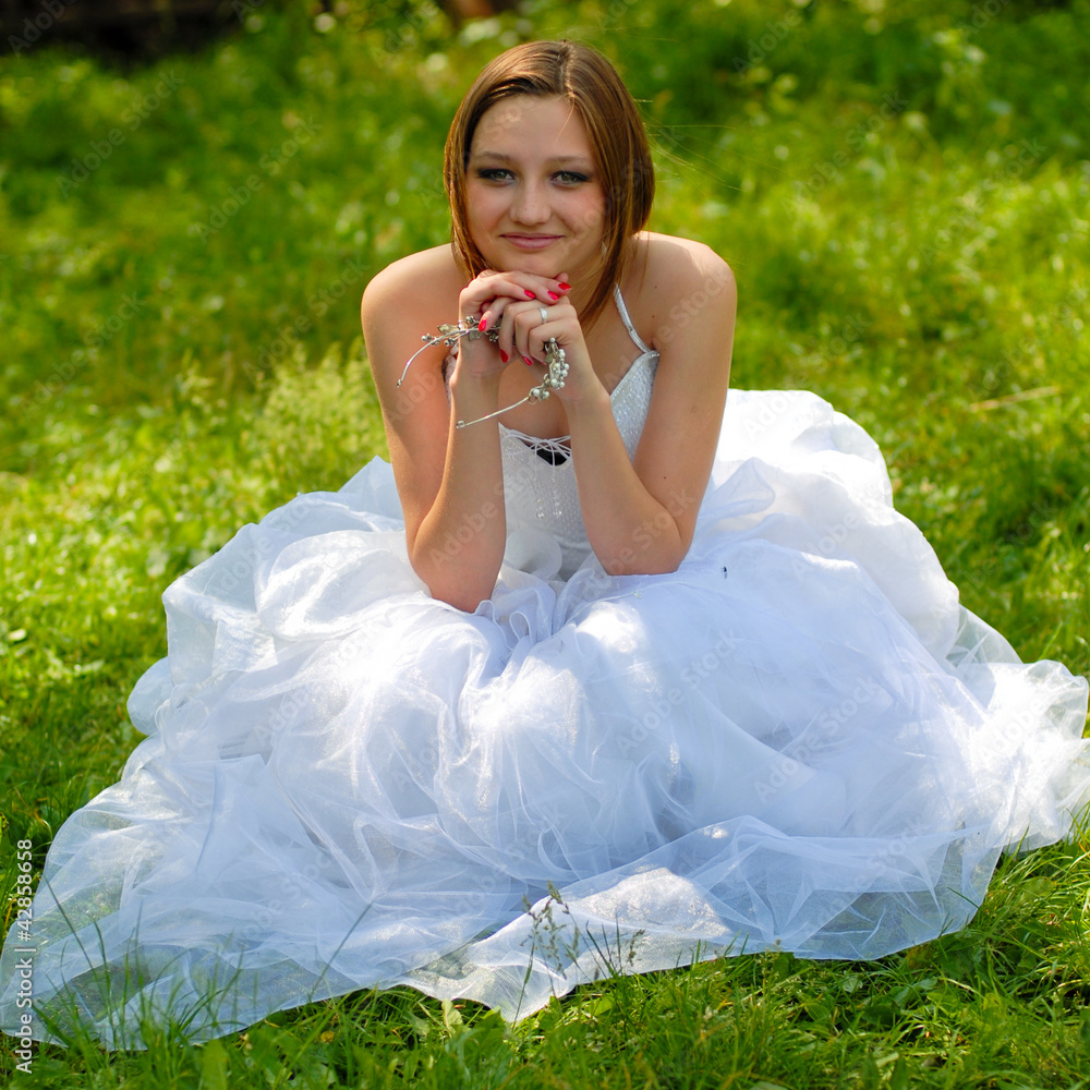 Sticker Beautiful happy smiling bride in summer outdoors portrait