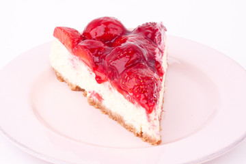 a slice of strawberry cheesecake
