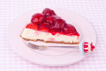a slice of strawberry cheesecake
