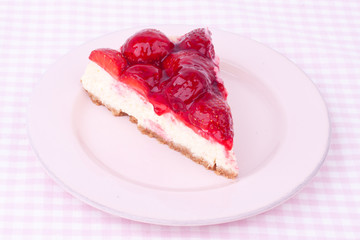 a slice of strawberry cheesecake