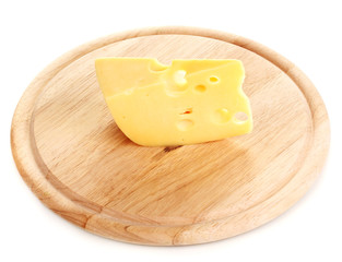 Cheese on cutting board isolated on white