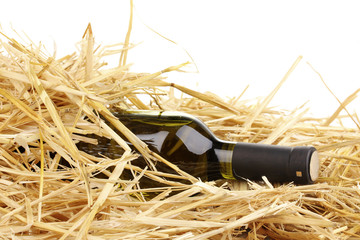 Bottle of great wine on hay