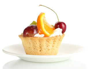 sweet cake with fruits on plate isolated on white