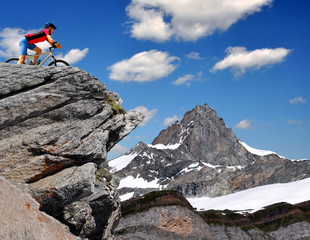 Naklejka premium biker in the Swiss Alps