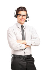 A male customer service operator wearing a headset