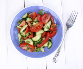 Fresh salad with tomatoes and cucumbers
