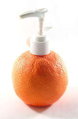 Fototapeta na wymiar plastic pump bottle of orange liquid soap isolated