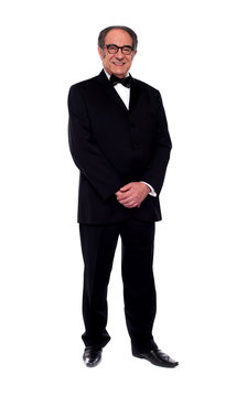 Attractive Senior Man Posing In Tuxedo