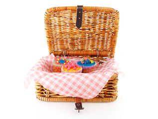Picnic basket with decorated cupcakes