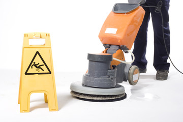 cleaning floor with machine
