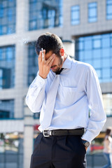 Tired businessman smoking