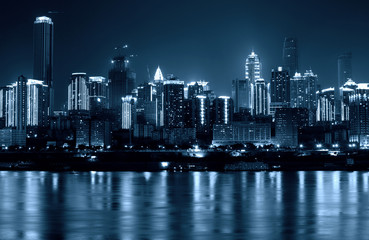 Skyscrapers reflecting in the river