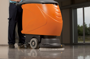 cleaning floor with machine