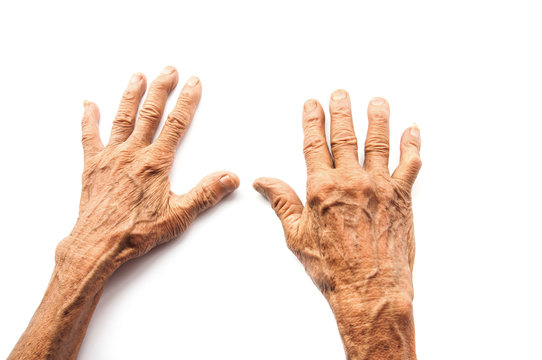 dirty hands of the old man on a white background