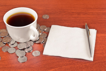Cup of coffee and napkin