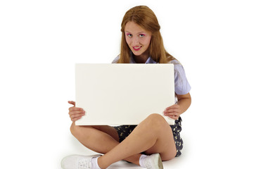 Fototapeta premium girl sitting down with blank board