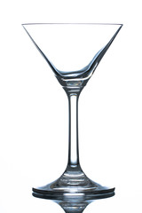 Empty martini glass on white.