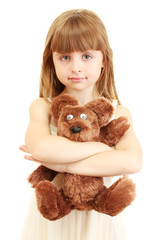 Portrait of beautiful cute girl with toy bear isolated on white