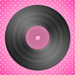 black vinyl record on pink dotted background
