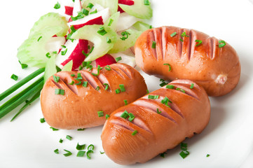 sausages on the grill