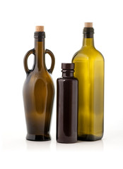 Three empted oil bottles